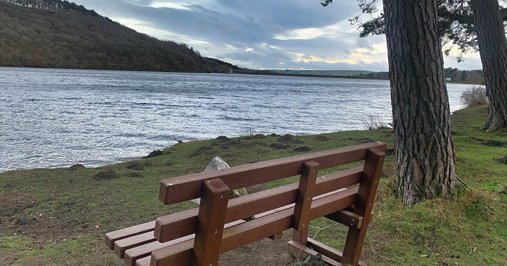 View of Tunstall Reservoir from a bench courtesy of  Andrew Marshall, Wolsingham Wayfarers.